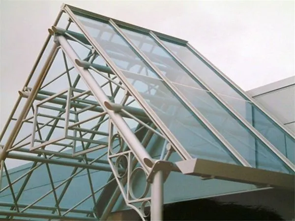 Blue Tint Glass Supported Entrance Feature Retail Outlet Bradford